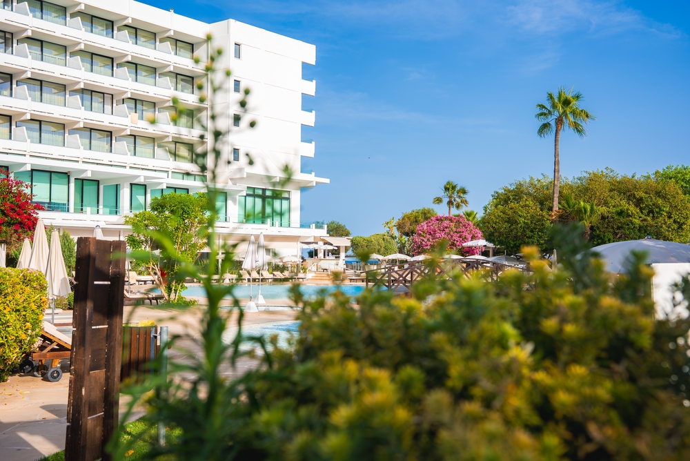 hotel landscaping with plants and greenery by the pool