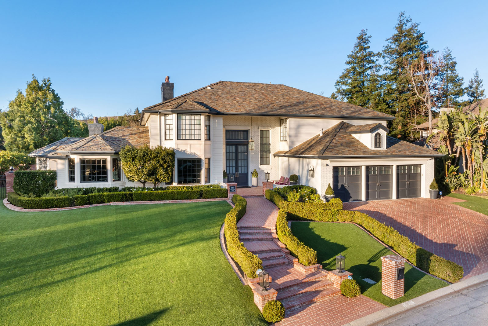 New Leaf Service Real Estate Lawn and Brick Driveway